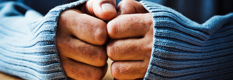 close up shot of knuckles pressed together