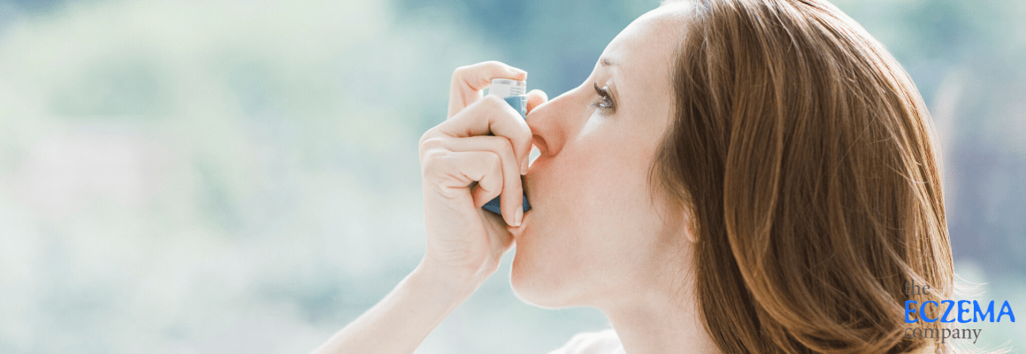side profile of woman using asthma inhaler