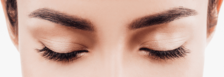 women looking down so we see her eyelashes