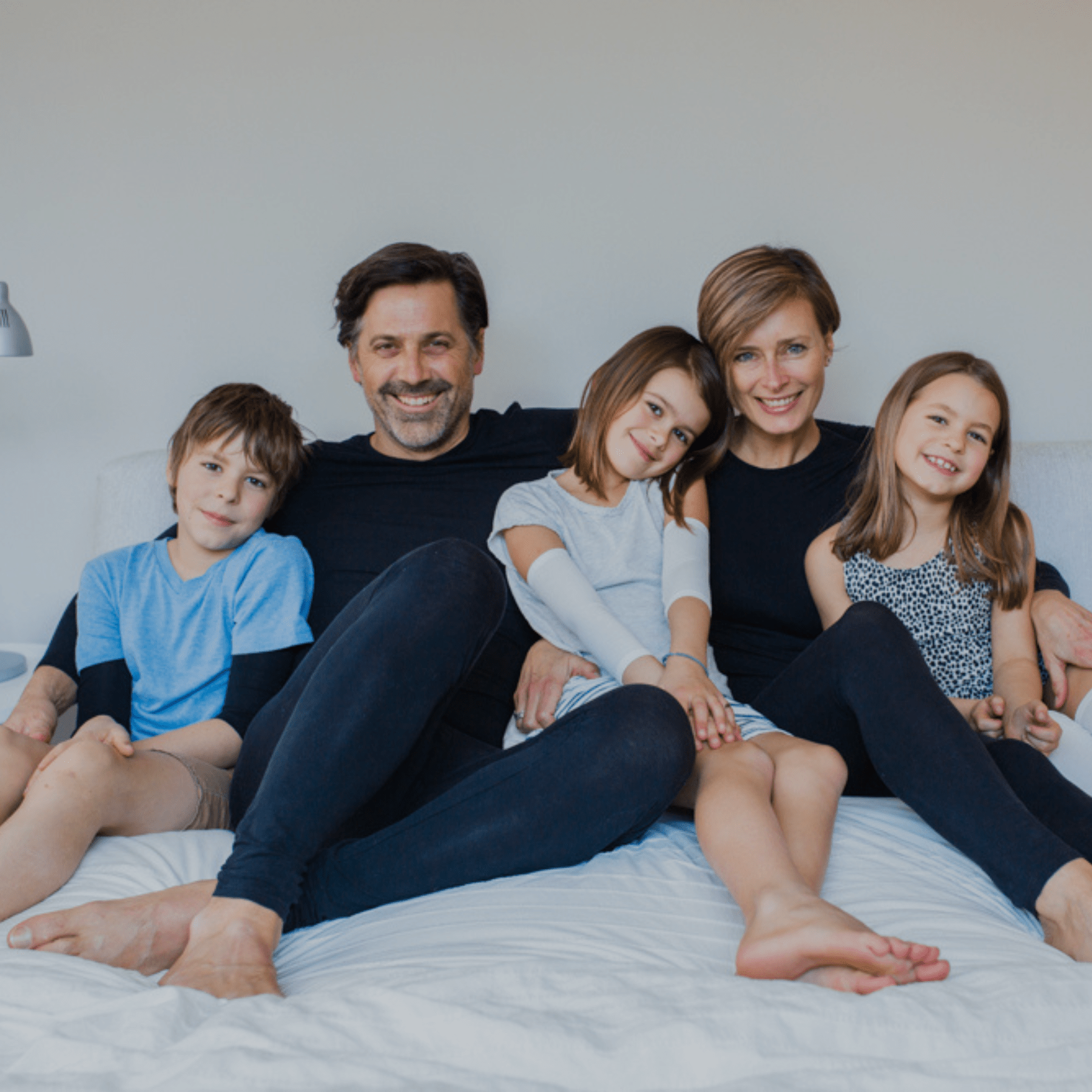 Remedywear - family on couch with wet wraps