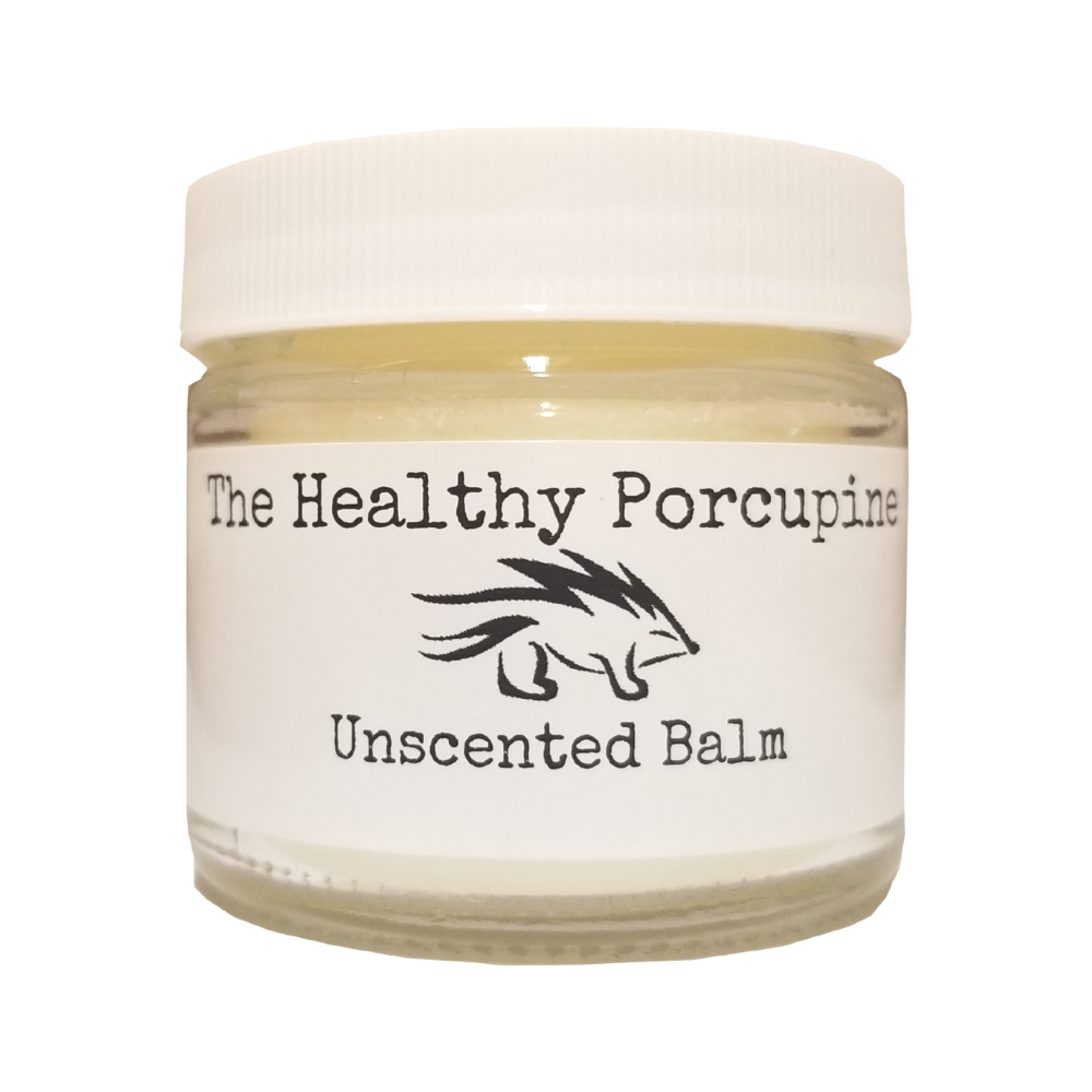 Glass jar of grass fed tallow balm with white lid and white label.
