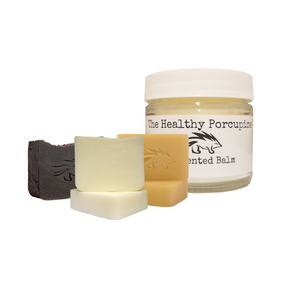 All four bundled products together with a white background. The tallow balm, and three tallow soaps.
