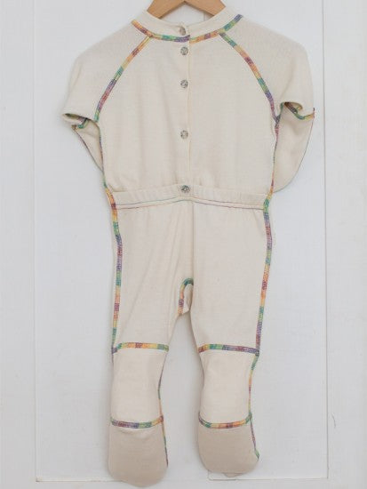 Back of one piece footie on hanger.
