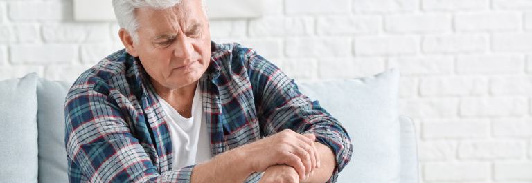 man with dementia picking at his skin