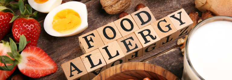 strawberries, egg and "food allergy" in block letters 