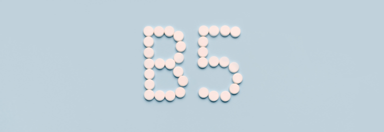 Pantothenic Acid pills in the shape of Vitamin B5