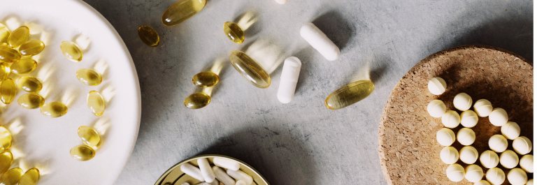 vitamins spread out on countertop
