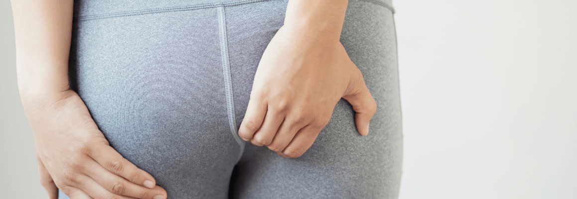 women scratching butt - anal eczema