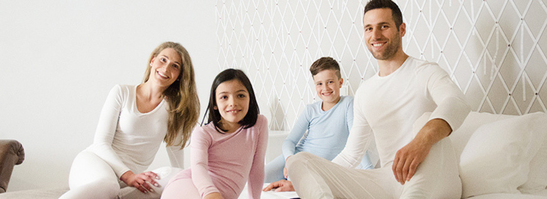 family of four wearing tencel pajamas