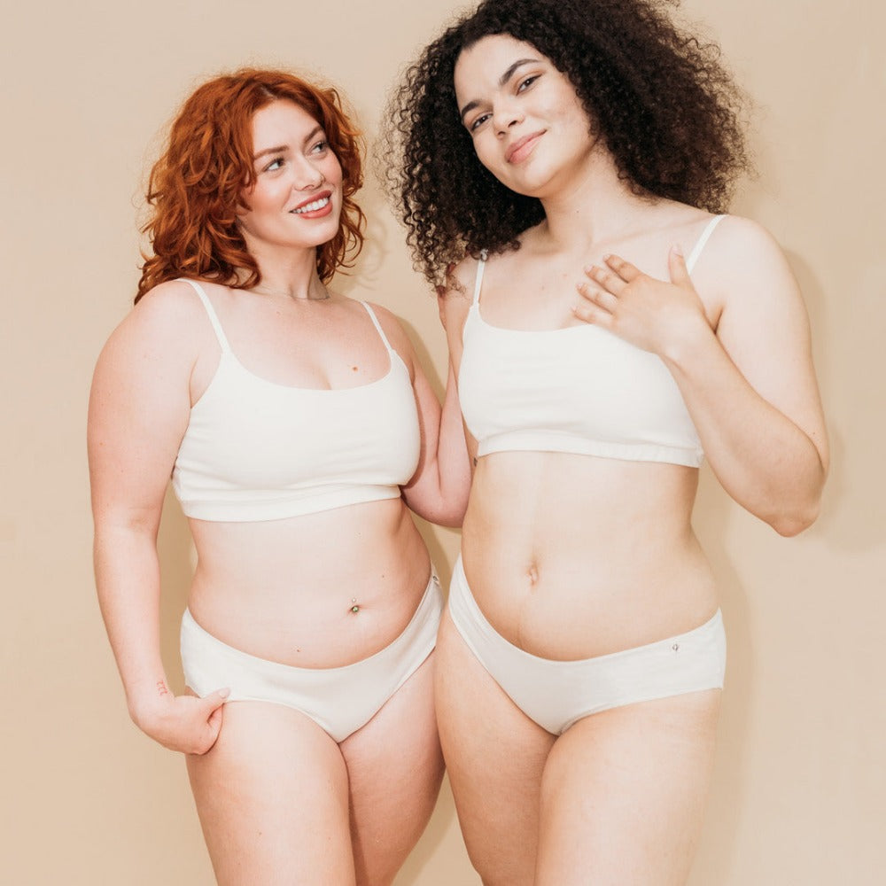 Two women wearing Q for Quinn Everyday Bikini in natural organic cotton, gentle underwear for eczema-prone skin