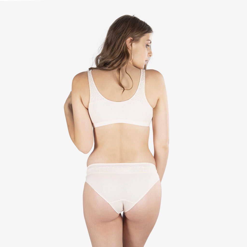 back view of woman wearing Organic pima cotton and 100% pure silk briefs with matching bra