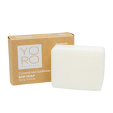 coconut and sunflower oil soap bar sitting next to it's box in kraft cardboard