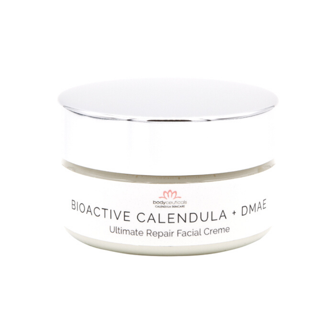 Front of calendula facial cream jar. Metal lid with white label.