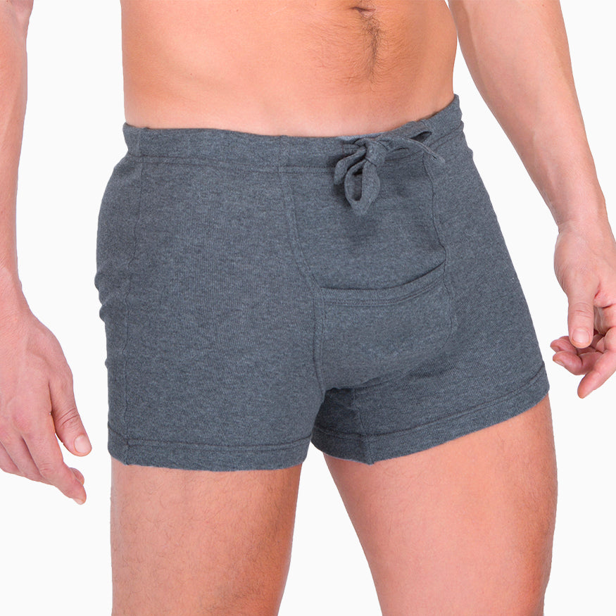 Grey 100% cotton, elastic free men's boxer briefs shown on a model from the side.