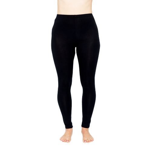 Model wearing black Remedywer pants for adult onset eczema.
