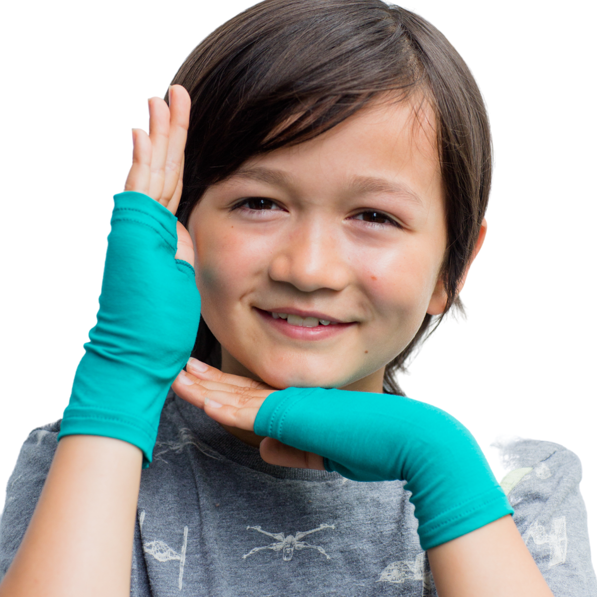 Boy framing his face with hands wearing teal Remedywear eczema gloves.