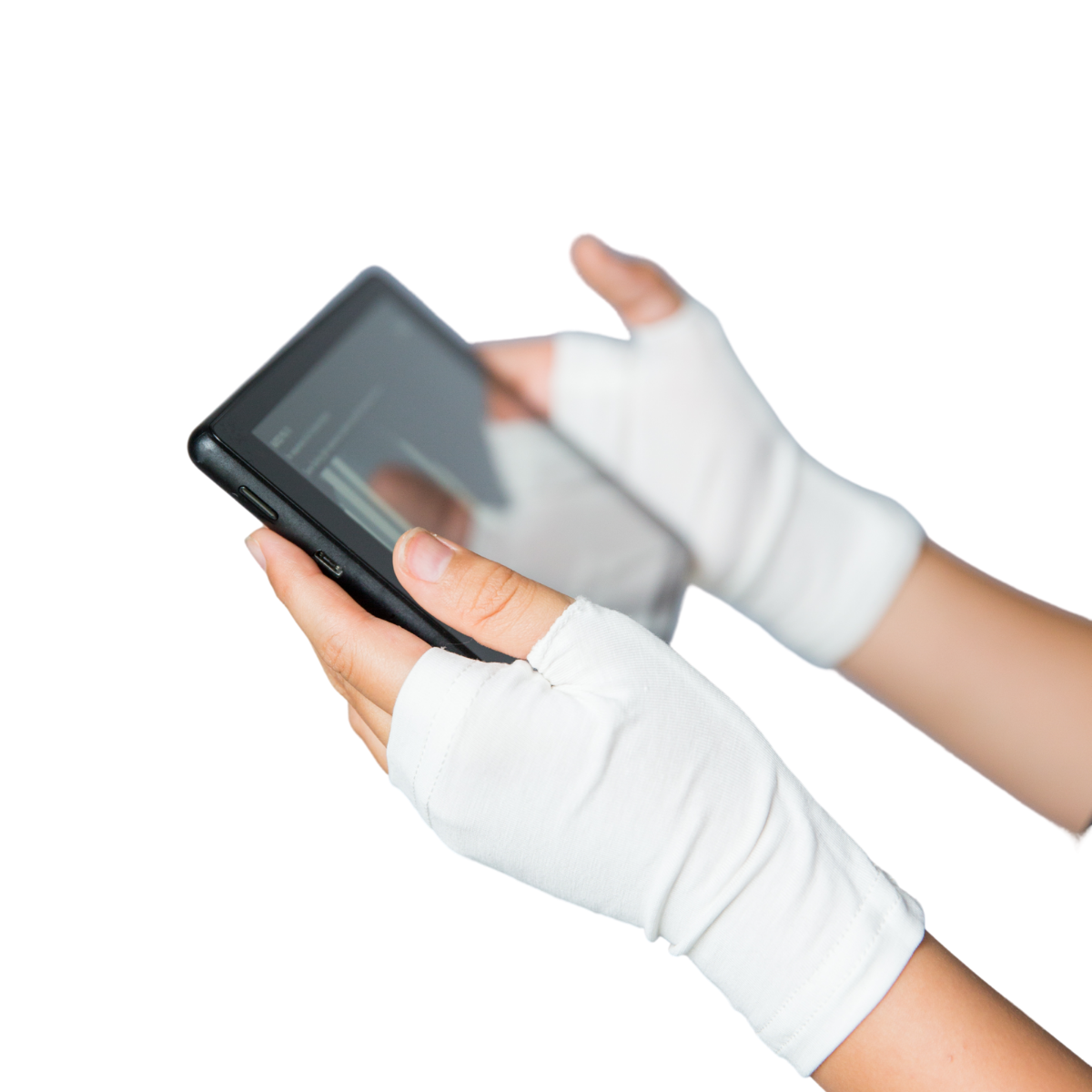 Two hands wearing white Remedywear fingerless gloves for eczema while playing with a tablet.