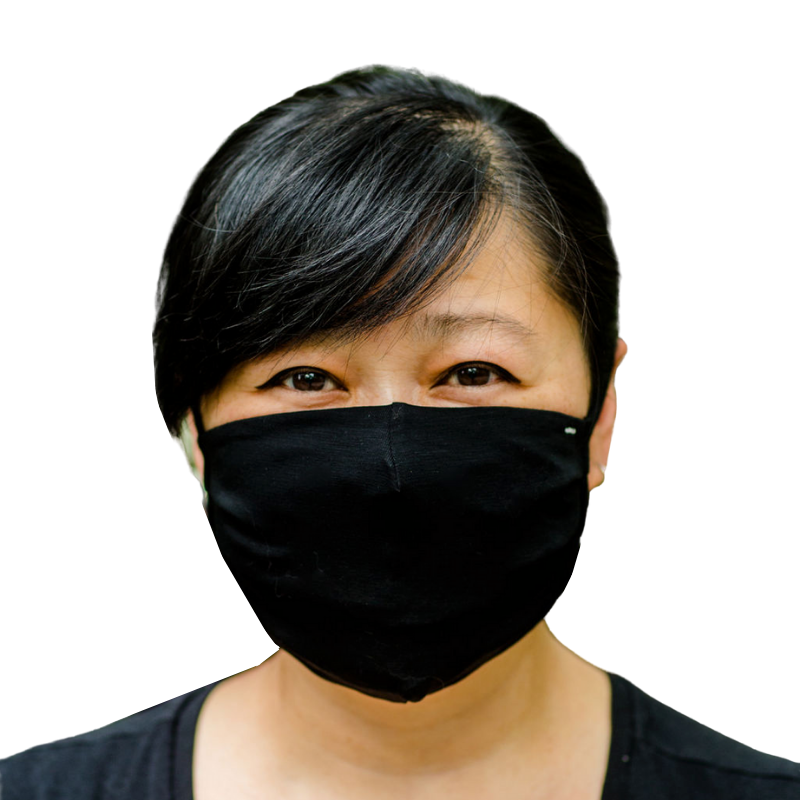 Woman wearing a Remedywear 3 ply face mask in black.
