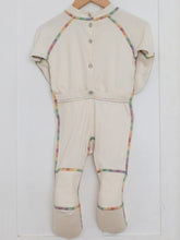 Back of one piece footie on hanger.